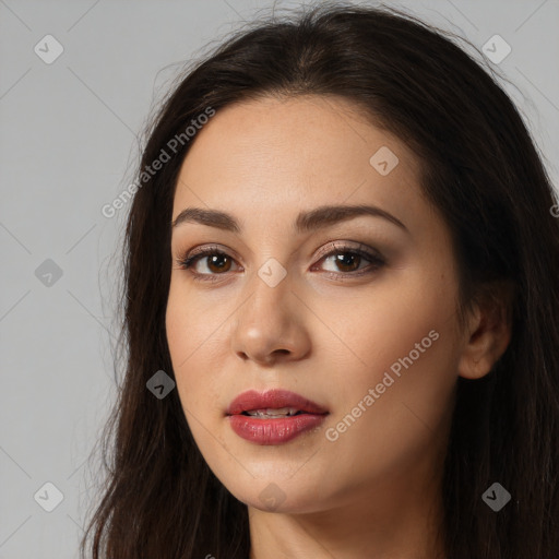 Neutral white young-adult female with long  brown hair and brown eyes