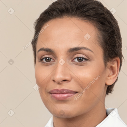 Joyful white young-adult female with short  brown hair and brown eyes