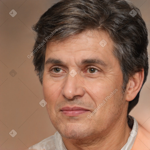 Joyful white middle-aged male with short  brown hair and brown eyes