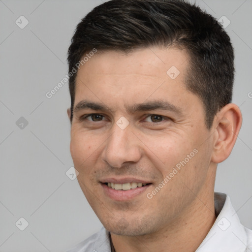 Joyful white young-adult male with short  brown hair and brown eyes