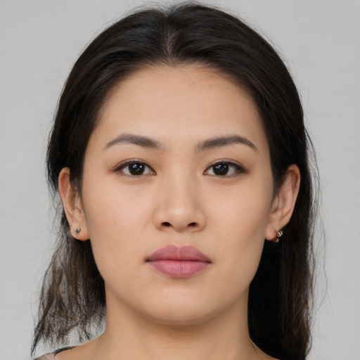Neutral asian young-adult female with medium  brown hair and brown eyes