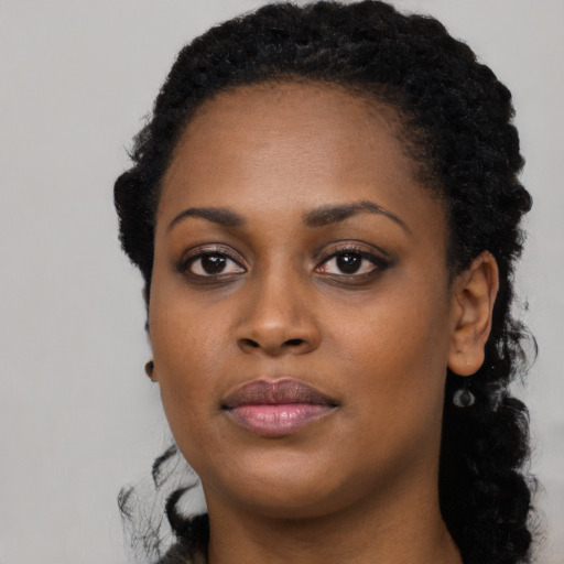 Neutral black young-adult female with long  black hair and brown eyes
