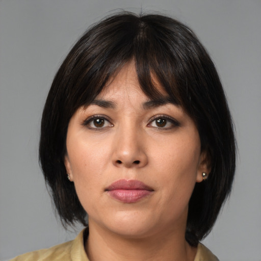 Neutral asian young-adult female with medium  brown hair and brown eyes