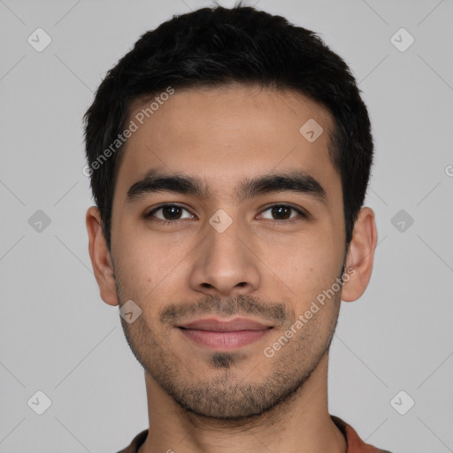 Joyful latino young-adult male with short  black hair and brown eyes