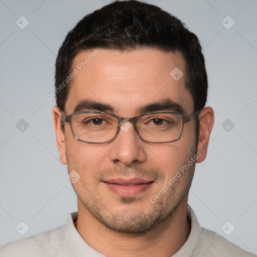 Joyful white young-adult male with short  black hair and brown eyes