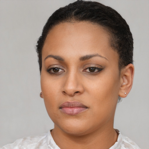 Neutral latino young-adult female with short  black hair and brown eyes