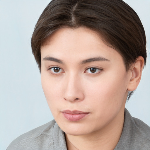 Neutral white young-adult female with short  brown hair and brown eyes