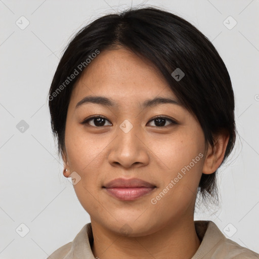 Joyful asian young-adult female with medium  black hair and brown eyes