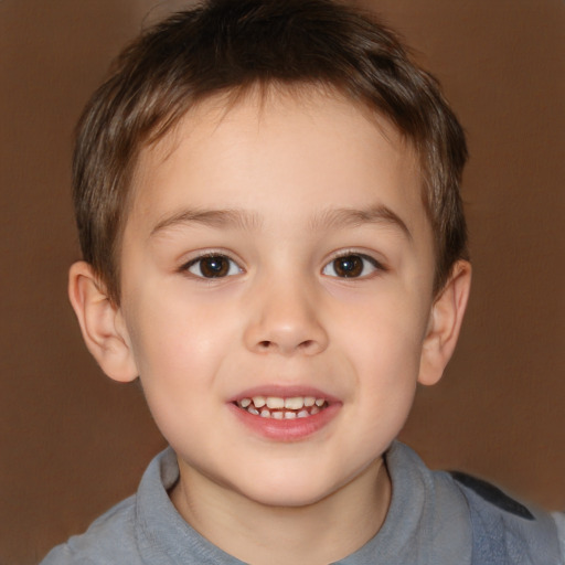 Joyful white child male with short  brown hair and brown eyes