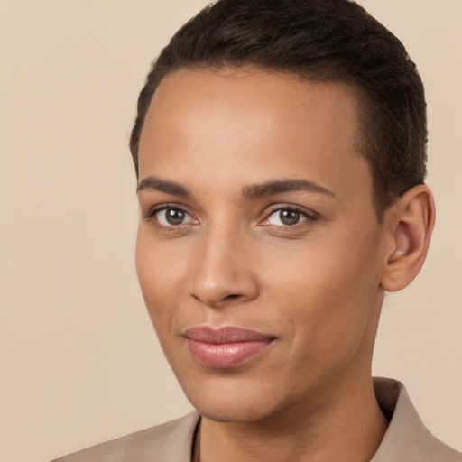 Joyful white young-adult female with short  brown hair and brown eyes