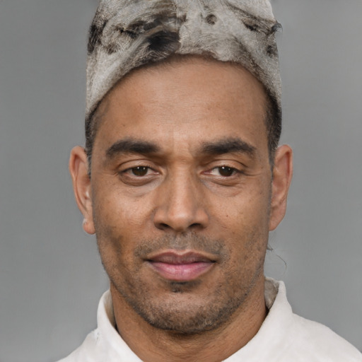 Neutral latino adult male with short  black hair and brown eyes