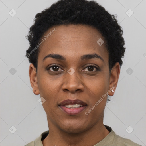 Joyful black young-adult female with short  black hair and brown eyes