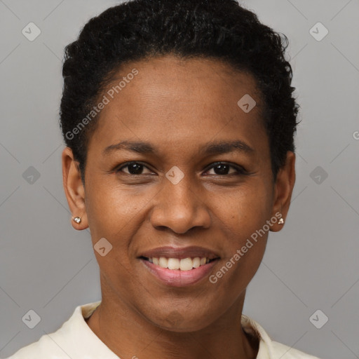 Joyful black young-adult female with short  black hair and brown eyes