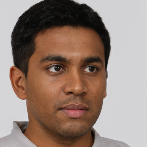 Neutral latino young-adult male with short  brown hair and brown eyes