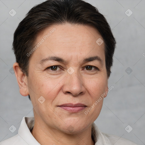 Joyful white adult female with short  brown hair and brown eyes