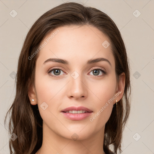 Neutral white young-adult female with long  brown hair and brown eyes