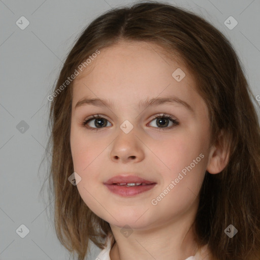 Joyful white child female with medium  brown hair and brown eyes