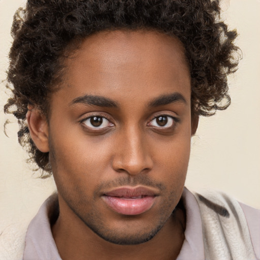 Neutral black young-adult male with short  brown hair and brown eyes