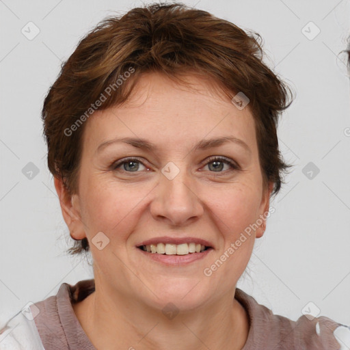 Joyful white adult female with short  brown hair and brown eyes