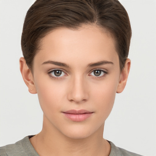 Neutral white young-adult female with short  brown hair and brown eyes