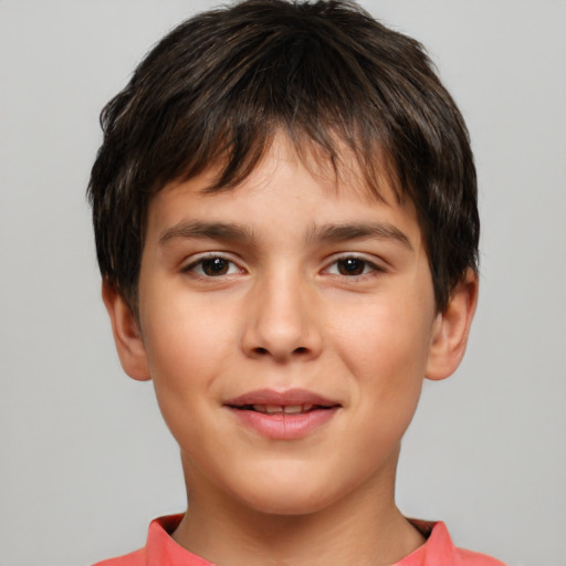 Joyful white child male with short  brown hair and brown eyes