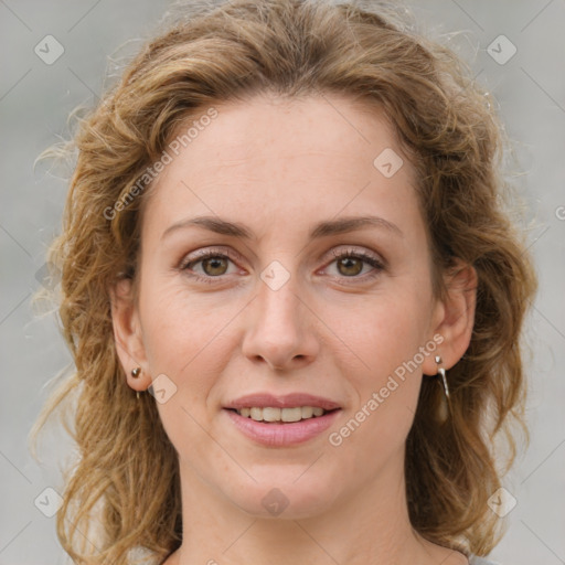 Joyful white young-adult female with medium  brown hair and green eyes