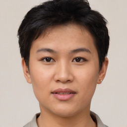 Joyful asian young-adult female with short  brown hair and brown eyes