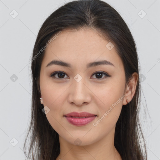 Joyful latino young-adult female with long  brown hair and brown eyes