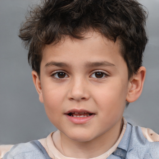 Joyful white child male with short  brown hair and brown eyes