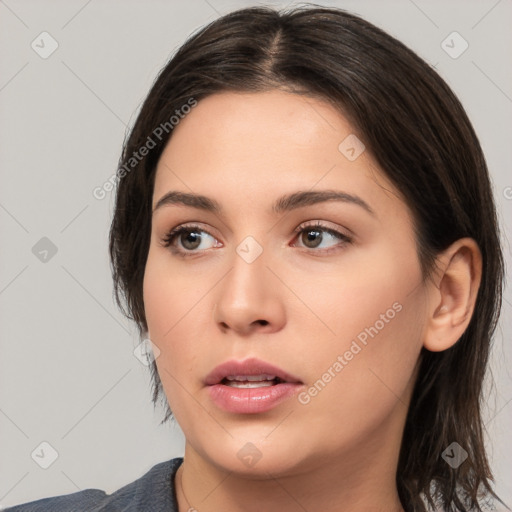 Neutral white young-adult female with medium  brown hair and brown eyes