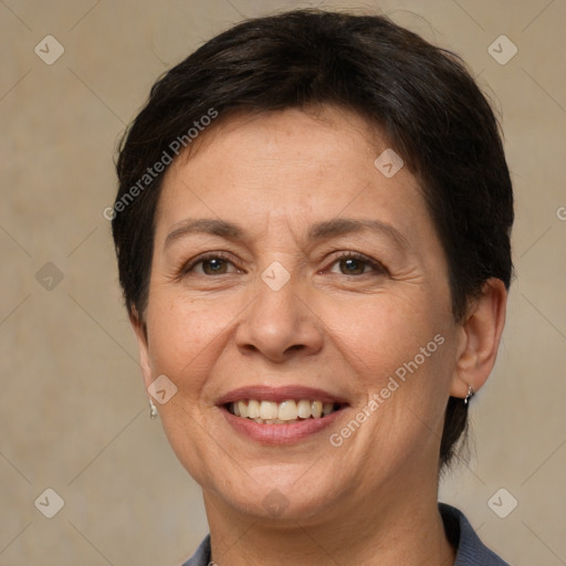 Joyful white adult female with short  brown hair and brown eyes