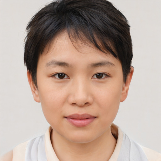 Joyful white child female with short  brown hair and brown eyes
