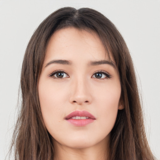 Neutral asian young-adult female with long  brown hair and brown eyes