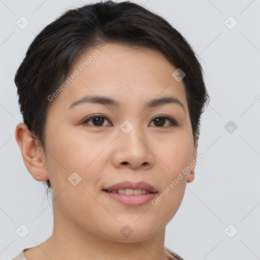 Joyful asian young-adult female with short  brown hair and brown eyes