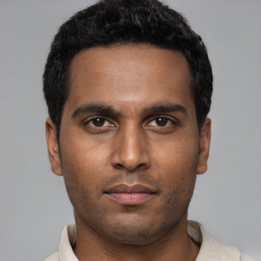 Neutral black young-adult male with short  brown hair and brown eyes