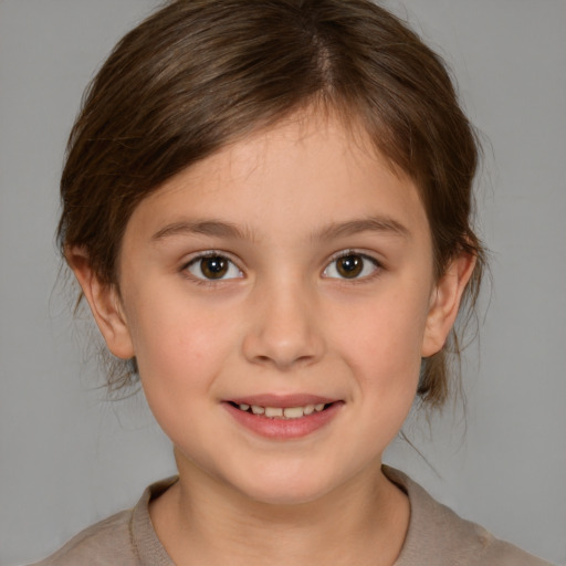 Joyful white child female with medium  brown hair and brown eyes