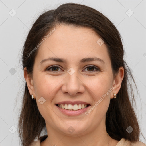 Joyful white young-adult female with medium  brown hair and brown eyes