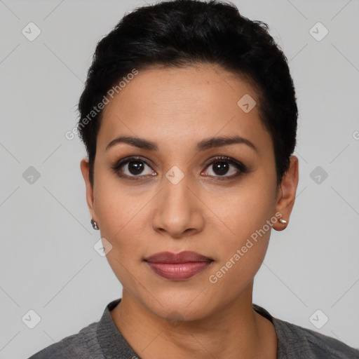 Joyful latino young-adult female with short  black hair and brown eyes