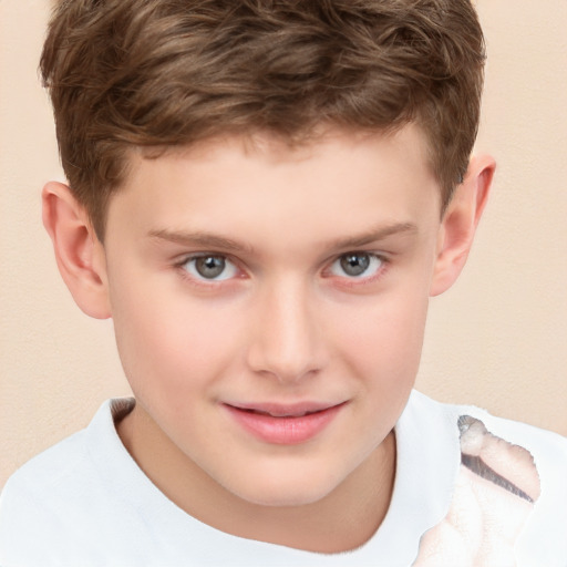 Joyful white child male with short  brown hair and brown eyes