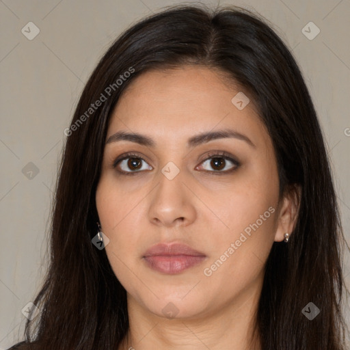 Neutral white young-adult female with long  brown hair and brown eyes