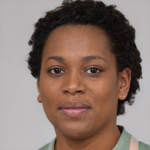 Neutral black young-adult female with short  brown hair and brown eyes