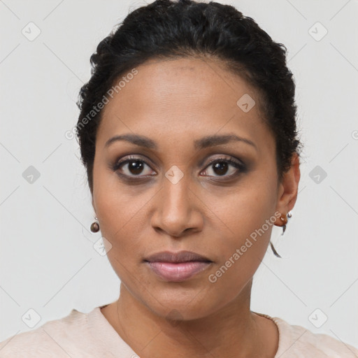 Joyful latino young-adult female with short  black hair and brown eyes