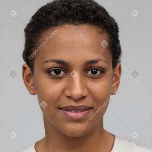 Joyful black young-adult female with short  brown hair and brown eyes