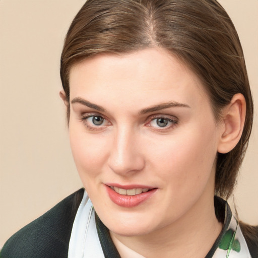 Joyful white young-adult female with medium  brown hair and blue eyes