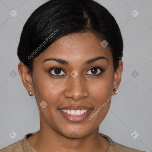 Joyful black young-adult female with short  black hair and brown eyes