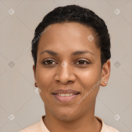 Joyful black young-adult female with short  black hair and brown eyes