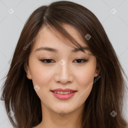 Joyful asian young-adult female with long  brown hair and brown eyes