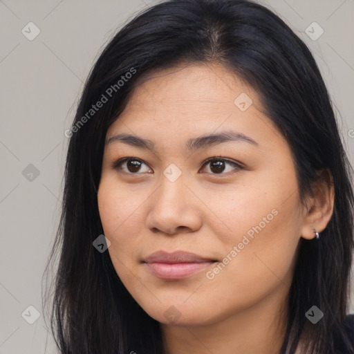 Joyful asian young-adult female with long  brown hair and brown eyes