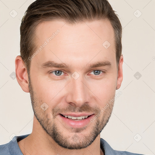 Joyful white young-adult male with short  brown hair and grey eyes