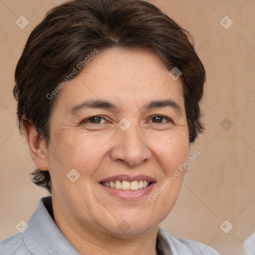 Joyful white adult female with medium  brown hair and brown eyes